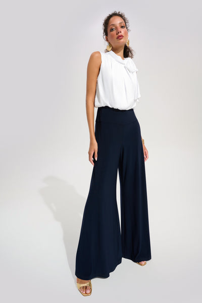 Joseph Ribkoff Signature | Silky Knit And Satin Wide Leg Jumpsuit With Contrast Bodice And Neck Bow Tie