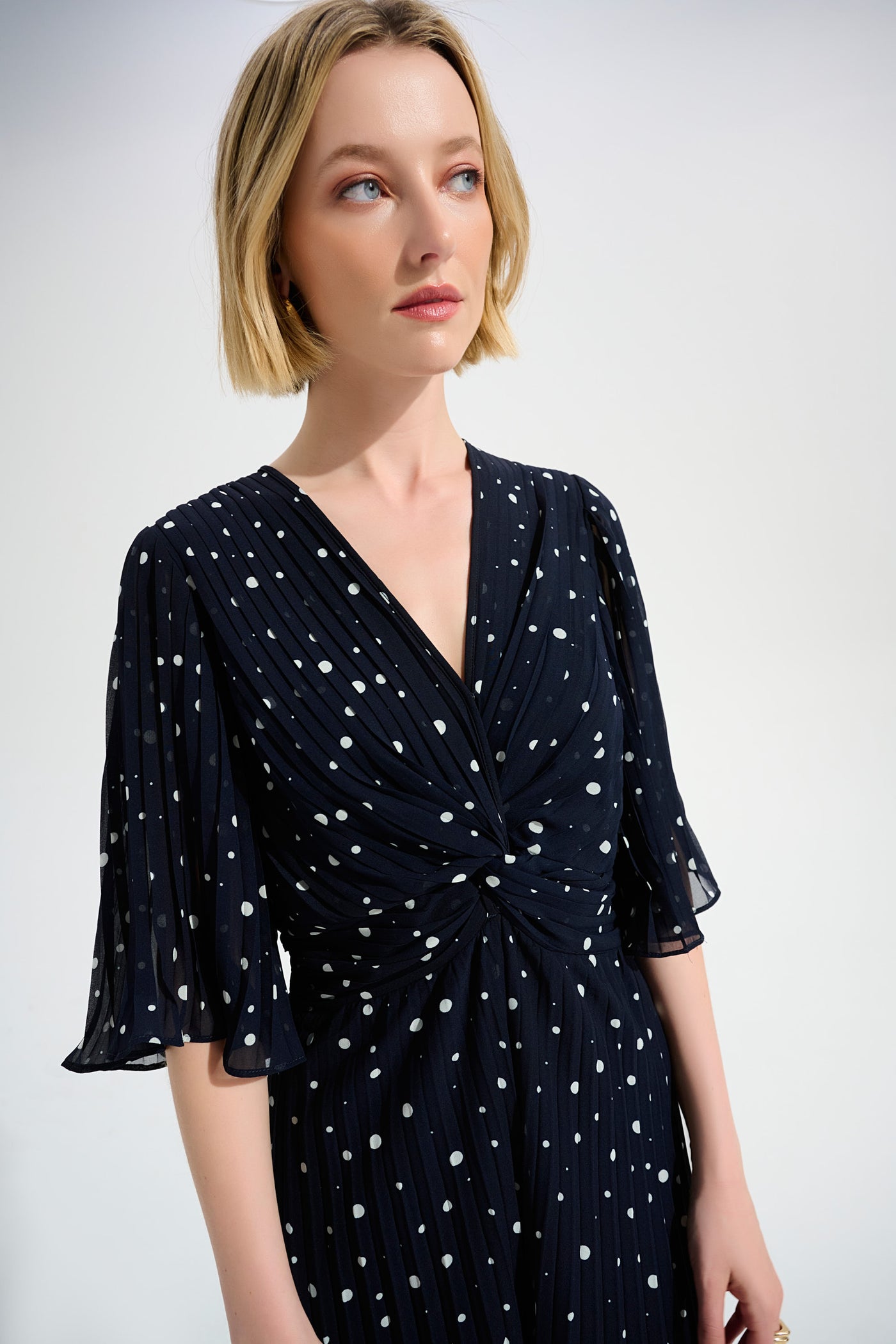 Joseph Ribkoff Midnight Blue Pleated Chiffon Dot Print Wide Leg Jumpsuit With Knot Detail