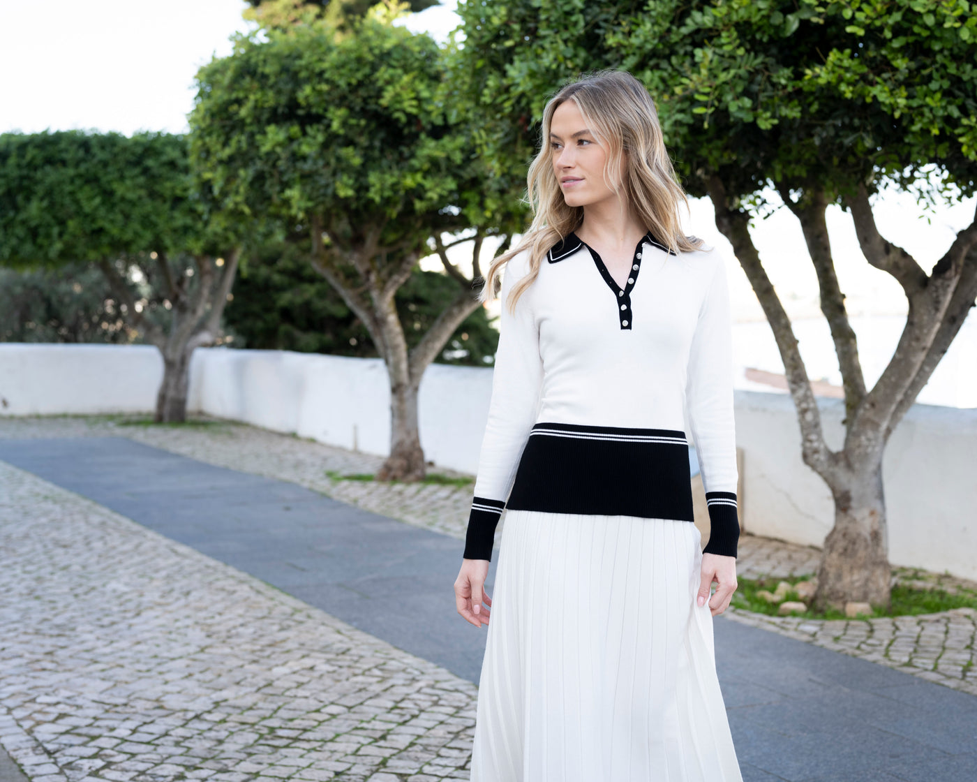 Long Sleeved Black and White Jumper with Button Detail and Collar