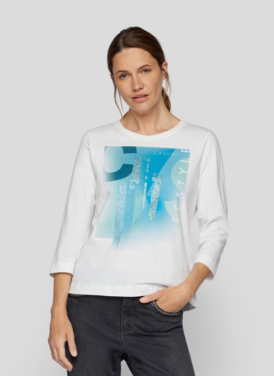 Cream Long Sleeve Top with Peacock Blue Graphic Print
