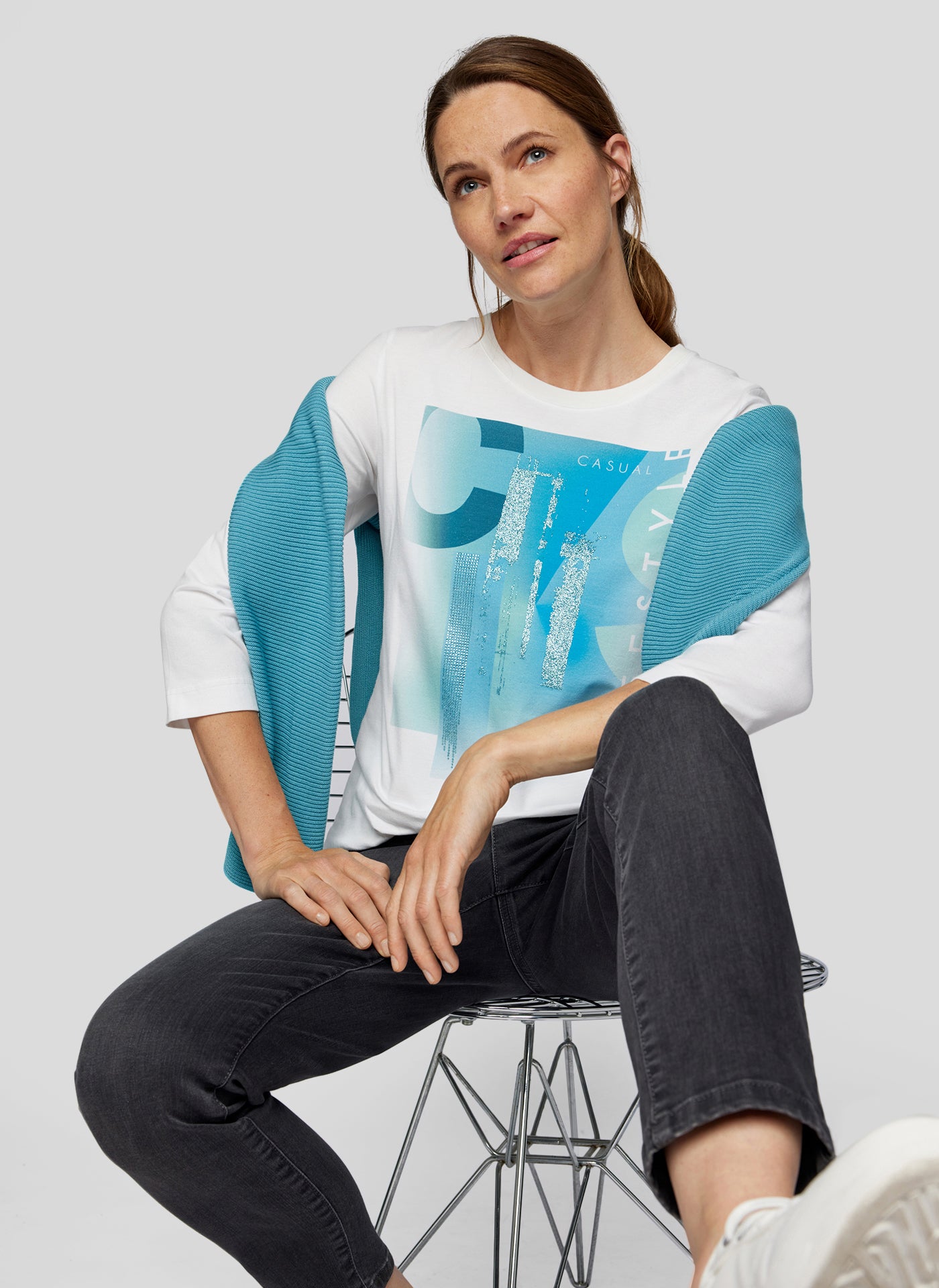 Cream Long Sleeve Top with Peacock Blue Graphic Print