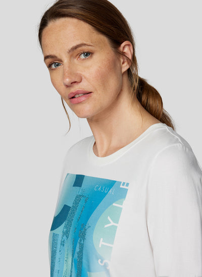 Cream Long Sleeve Top with Peacock Blue Graphic Print