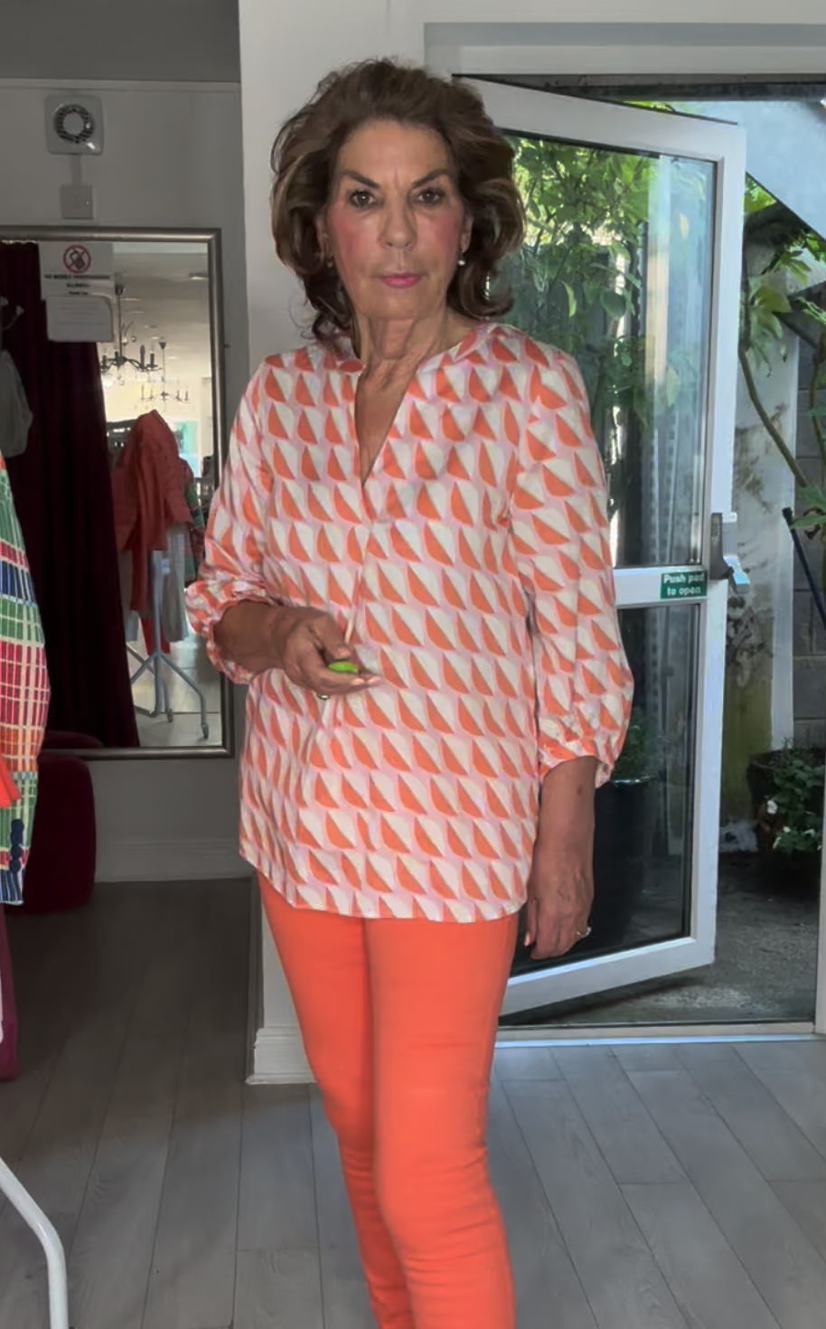 V-Neck Orange /White Leaf Design Blouse with Pink Background