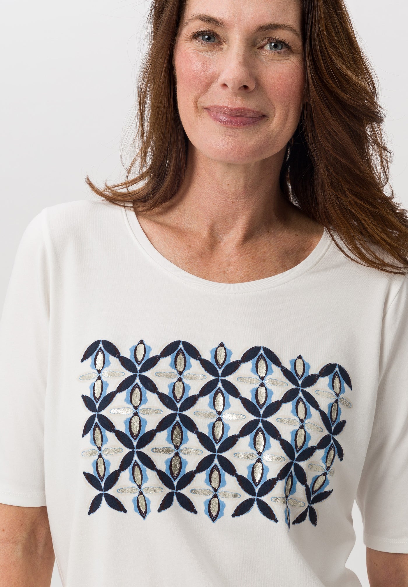 Cream T-Shirt with Floral Pattern and Round Neck